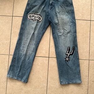 SLIGHTLY USED PAIR OF VINTAGE UNK SAN ANTONIO SPURS JEANS JEANS SIZE 34x28 FROM